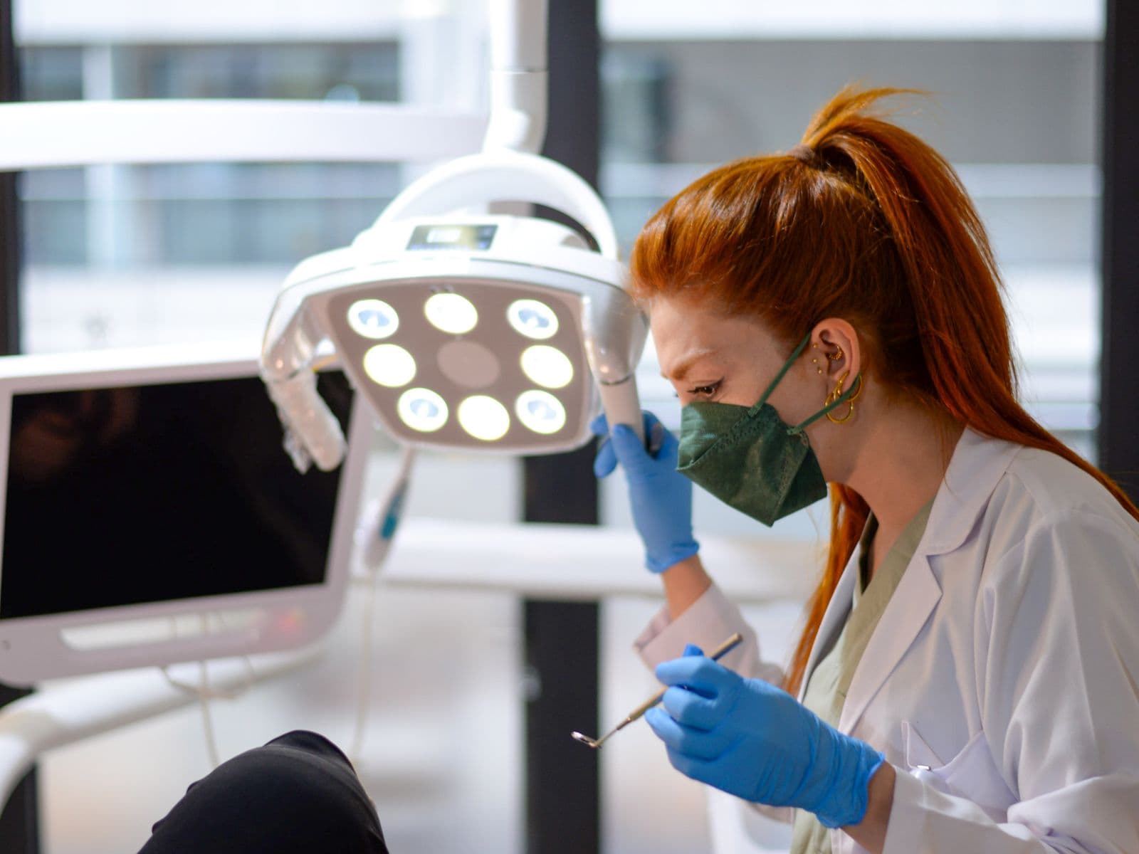 A dentist carrying out treatment at Pocklington Dental