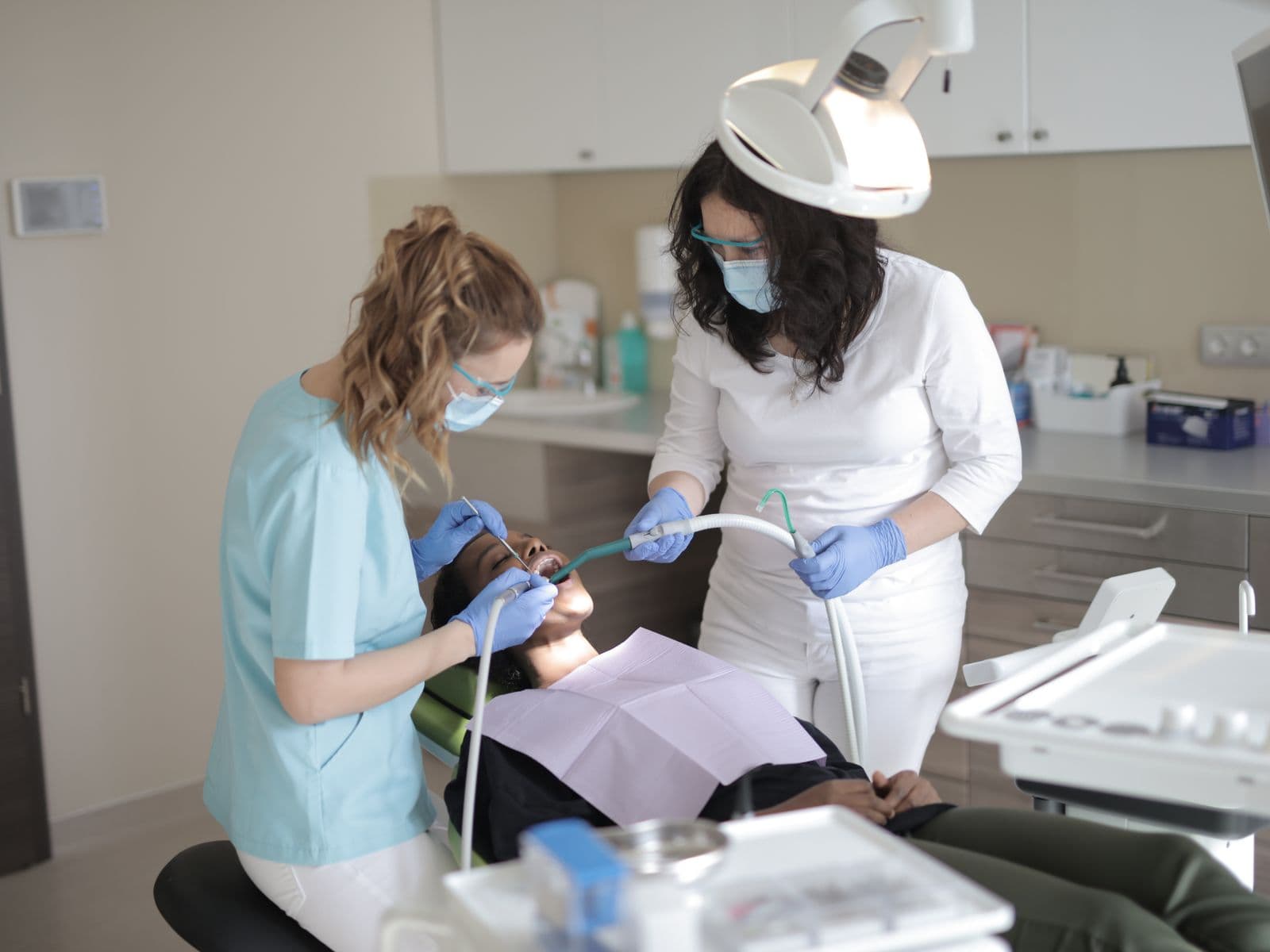 A Pocklington Dental clinician carrying out hygiene treatment